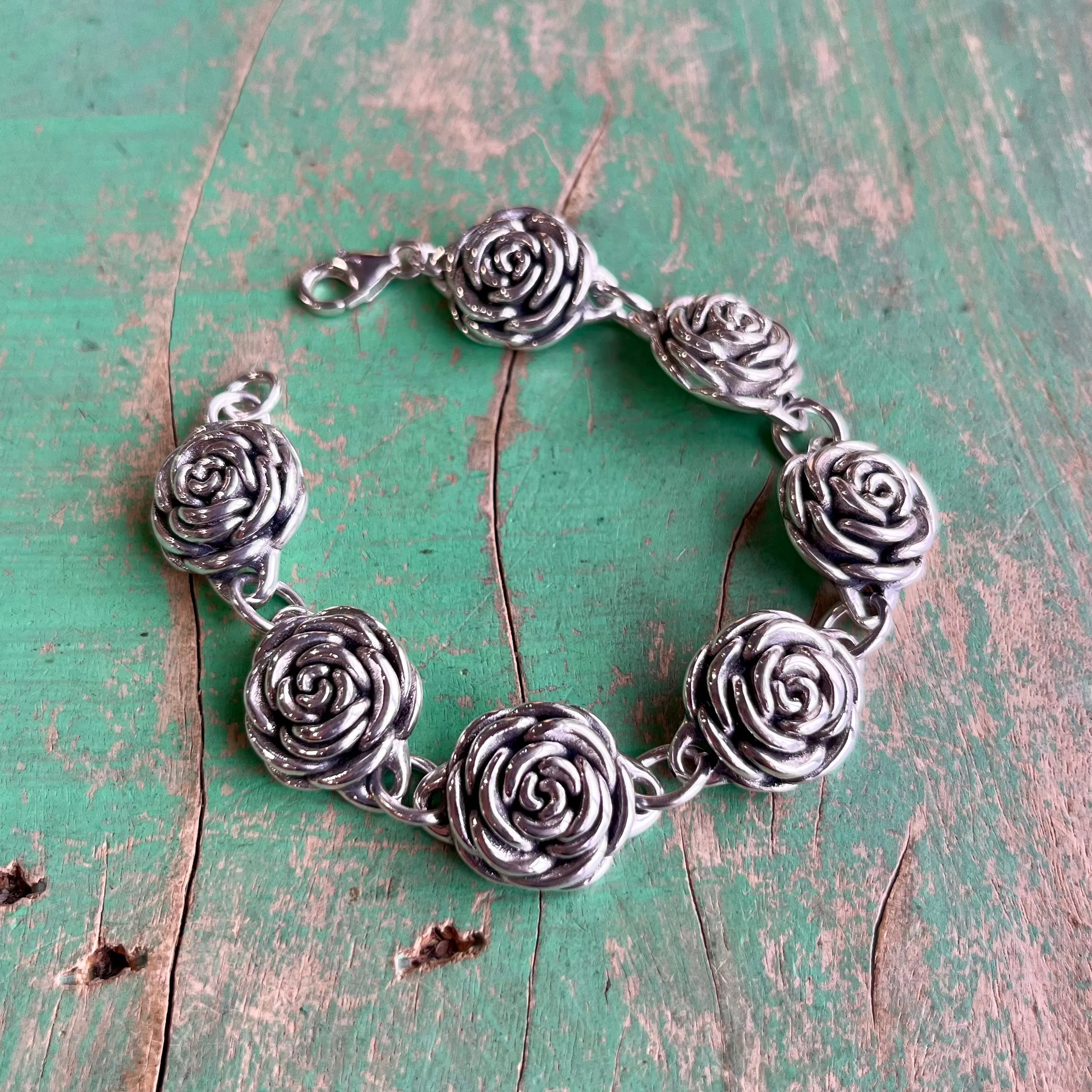 Sterling Silver Seven Rose Bud Bracelet